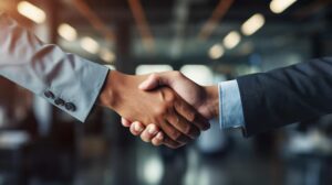 680bbbbc98029 two businessmen shaking hands 978075 709